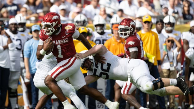 Jan 1, 2022; Tampa, FL, USA; Arkansas Razorbacks quarterback KJ Jefferson (1) rushes with the ball during the first half against the Penn State Nittany Lions during the 2022 Outback Bowl at Raymond James Stadium. Mandatory Credit: Matt Pendleton-USA TODAY Sports